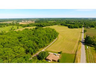 Tract 4 with Tract 3 in Background - REAL ESTATE AUCTION - 2 PRESTIGUOUS HOMES - 66+/- ACRES IN 5 TRACTS IN NOBLE COUNTY, INDIANA
